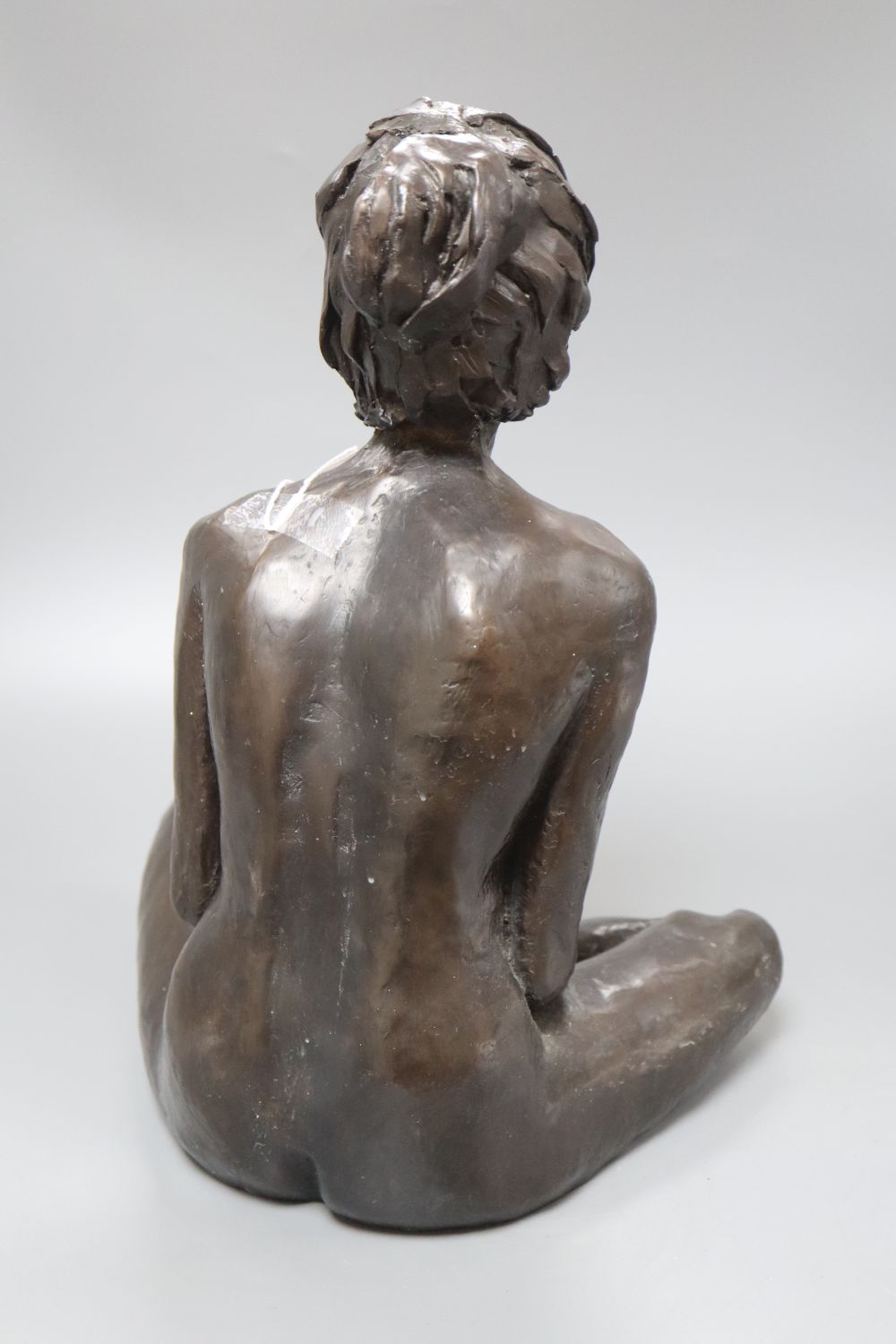 A modern bronzed resin model of a nude Mona, 32cm high